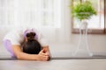 Cloese up hand.Asian woman working out in sportswear while doing yoga, seated in Child exercise, Balasana stance Royalty Free Stock Photo