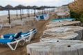 Cloesup of wooden poles, standing at the beach. Royalty Free Stock Photo