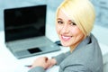 Cloeup portrait of a young smiling businesswoman looking at camera Royalty Free Stock Photo