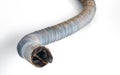 Clogged plastic corrugated drain hose. Royalty Free Stock Photo