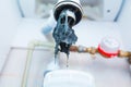 Clogged sink pipe. Unclog a drain from hairs and other stuff. Checking Hydraulic trap for draining water under the sink Royalty Free Stock Photo