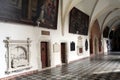 Cloister in dominican convent with epitaphs on tle walls. Royalty Free Stock Photo
