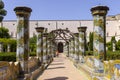 Cloister Santa Chiara with octagonal columns decorated with majolica tiles in rococo style, Naples, Italy