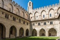 Cloisters inside the Papal Palace, Avignon, France, enclosed by battlements Royalty Free Stock Photo