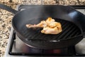 Clos eup phtoto of chicken meat and grill pan Royalty Free Stock Photo