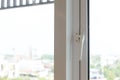 Close aluminium window with latch handle