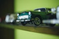 A close attention to the details. Retro styled cars. Toy cars with retro design. Retro car models on shelf. Classic