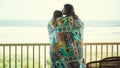 So close they become one. an affectionate young couple wrapped in a blanket on the balcony. Royalty Free Stock Photo