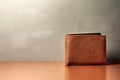 A close brown leather wallet on background with copy space