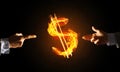 Concept of money making with dollar currency fire symbol on dark background