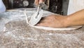 Close Chef making pizza, selective focus on front