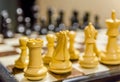 Close chessboard with black and white figures