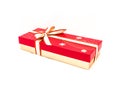 Close chocolate box with red and yellow bow ribbon isolated on white