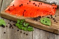 Close of cold smoked salmon on wooden server ready to eat Royalty Free Stock Photo