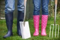 Close Of Couple Gardening Holding Spade And Fork Royalty Free Stock Photo