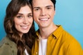 Close cropped photo of positive good mood couple harmony together wear stylish shirts smiling toothy beaming smile Royalty Free Stock Photo