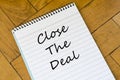 Close the deal concept on notebook Royalty Free Stock Photo