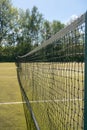 Detail of tennis net on court Royalty Free Stock Photo