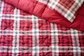 close detail of plaid bedding on a mattress Royalty Free Stock Photo