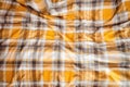 close detail of plaid bedding on a mattress Royalty Free Stock Photo