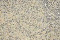 Close detailed view of a road surface constructed from crushed stone