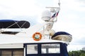 Close details of radar navigation system and communication tower on a fancy motor yacht Royalty Free Stock Photo