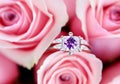Close Diamond ring on pale pink roses