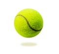 The close distance of the yellow tennis ball is pretty clear. Single ball isolated on a white background that can be easily used t