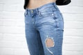 Close female blue jeans