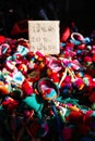 Close focus on colorful souvenir on shelf with blurry price tag