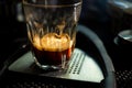 Close focus on double shot of hot espresso coffee on glass cup Royalty Free Stock Photo