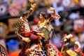 Close focus of memory of the city of Seville with a couple of figures dancing Sevillanas