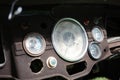 Close focus on old car mile gauge on vintage dashboard