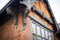 close focus on textured stonework of tudor gable wall