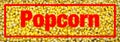 Close up of Fresh popped Movie Theater style buttery popcorn sign or banner