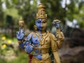 Close front view of Lord Shiva-Parvathi Ardanarishwara avatar idol isolated in Natural rock garden in Tirumala