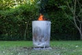 Close of a home made metal garden incinerator.