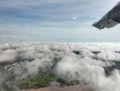 close image of cloud texture seen from airplane passenger window