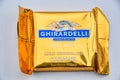 Close image of a single ghirardelli chocolate square Caramel