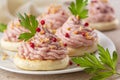 Close-up of Italian canapes with mortadella.