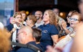 Close of lady singing passionately outside a bar in garachico, Tenerife, Spain