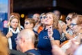 Close of lady singing passionately outside a bar in garachico, Tenerife, Spain