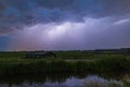 Close lighting strike in farmland Royalty Free Stock Photo