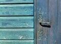 Lock Handle Of A  Blue Wooden Door On Blue Wooden Wall