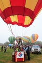 Hot air balloon basket, other balloons behind