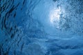 Close photo of many beautiful underwater air bubbles rise up through blue sea water from breathing ascending driver, close up Royalty Free Stock Photo