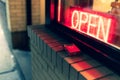 Picture of a cigarette box, night, open neon