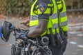 Close Of Police Men With Bicycles At Amsterdam The Netherlands 2018