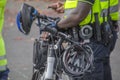 Close Of Police Men With Bicycles At Amsterdam The Netherlands 2018