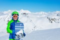 Close portrait of boy in ski helmet over mountain Royalty Free Stock Photo
